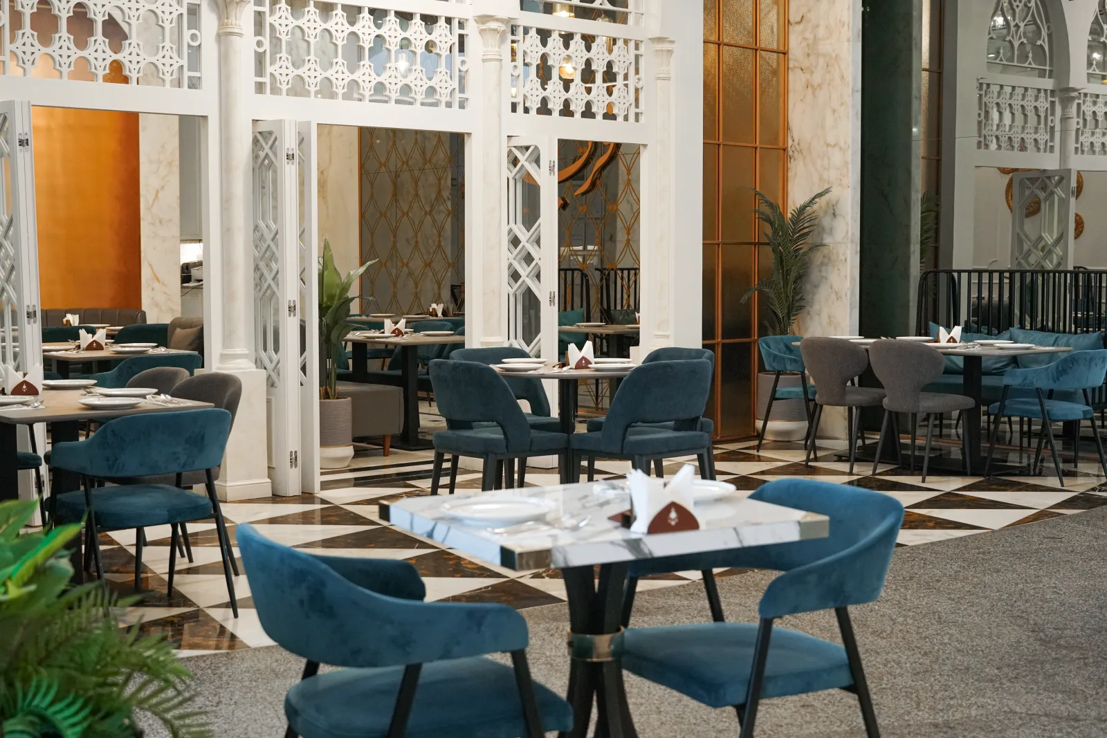 Tables under the Feryal arches